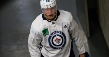 Patrik Laine's camp denies the speculation that he may not report to the Winnipeg Jets training camp if he's not traded. He hasn't asked for a trade.