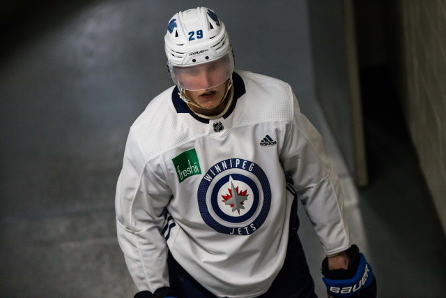 Patrik Laine's camp denies the speculation that he may not report to the Winnipeg Jets training camp if he's not traded. He hasn't asked for a trade.