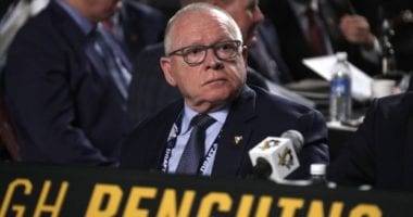 Sharks-Ducks-Senators make a three-team trade. Knights coach tested positive before last night's game. Penguins GM Jim Rutherford resigns.