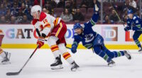 Sources are saying the Vancouver Canucks are looking to make some moves and could be eyeing two Calgary Flames defensemen.