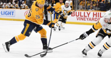 The Nashville Predators traded forward Philip Tomasino to the Pittsburgh Penguins for a 2027 fourth-round pick